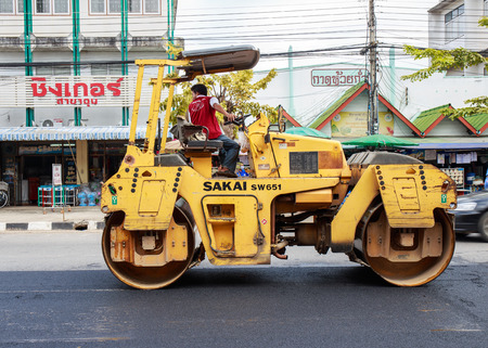 Light Vibration roller compactor while construction at road number 1021 Phayao, Thailand on December 7, 2015.のeditorial素材