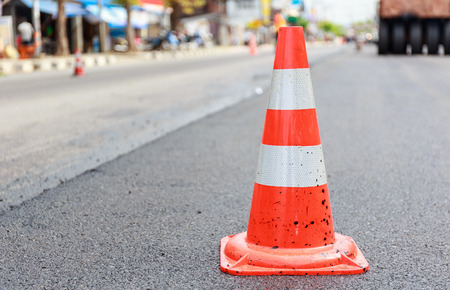 traffic cone on construction roadの写真素材