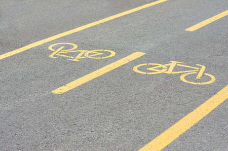 Bicycle lane signage on streetの写真素材
