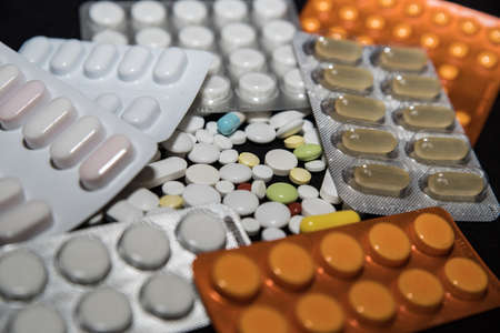 Bunch of drugs and pills in blisters