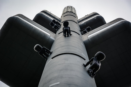 PRAGUE, CZECH REPUBLIC - April 3, 2017: The exterior of Zizkov Television Tower. In 2000 artist David Cerny installed ten sculptures called "Miminka" (Babies).のeditorial素材
