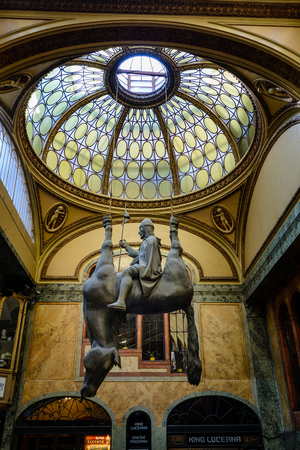 PRAGUE, CZECH REPUBLIC - APRIL 3, 2017: Statue of St. Wenceslas riding a dead horse by David Cerny. The sculpture is located in Lucerna Palace.のeditorial素材
