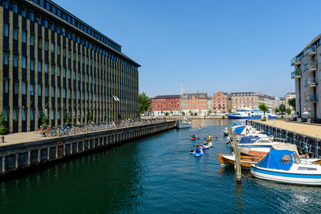 COPENHAGEN, DENMARK - June 23, 2016:  Children are kayaking in a water canal in Copenhagen, Denmarkのeditorial素材