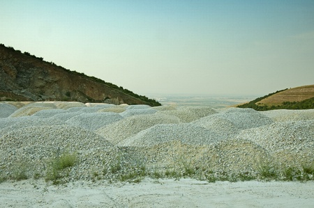 Quarry - Piles of gravel at industrial siteの写真素材