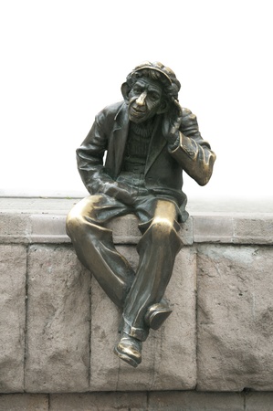 Sitting man who listening. Solated on white backgroundの写真素材