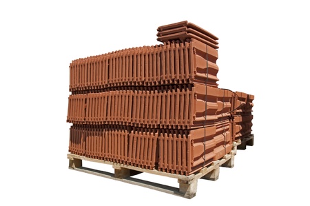 Pile of roofing tiles packaged. Isolated on whiteの写真素材