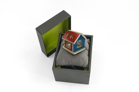Gift box with house inside. Jewelry box.Real estate