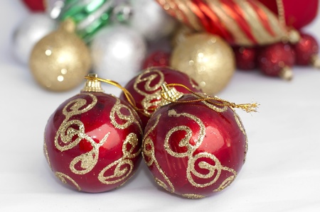 Christmas motifs with balls and chains. Red and white balls, white chains and red ribbonの写真素材