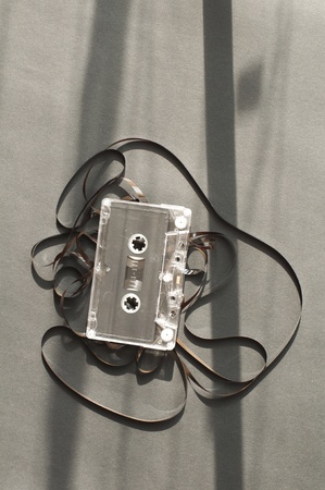 Audio tape cassette with subtracted out tape. Old broken cassetteの写真素材