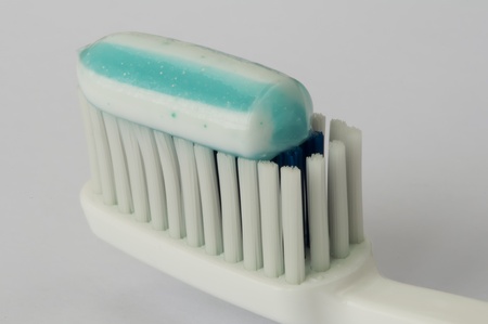 Toothbrush and toothpaste on top. Very close upの写真素材