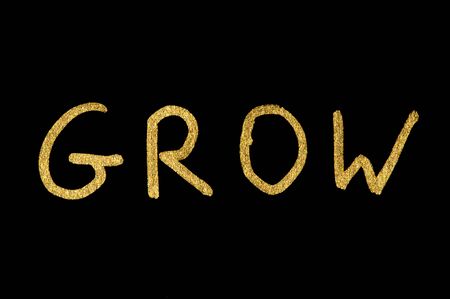 Text Grow over black backgroundの写真素材