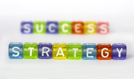 Text Strategy and success on colorful cubes over whiteの写真素材