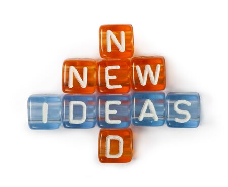 Texts Ideas, New and Need on colorful cubes over white