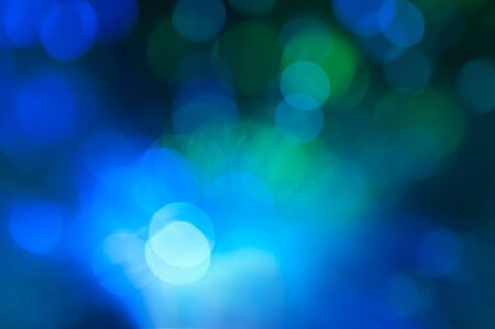 Blue and pink festive lights and circles backgroundの写真素材