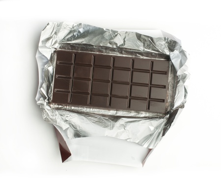 Chocolate bar in packaging of aluminum foilの写真素材