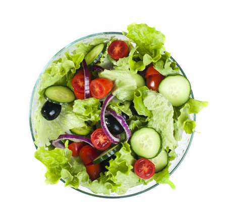 Mixed salad in a glass bowl on a white backgroundの写真素材