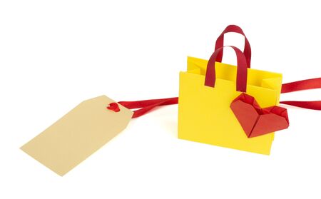 Origami shopping bag and label. White isolatedの写真素材