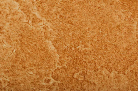 Brown wallpaper texture. Close up part of wallpaper