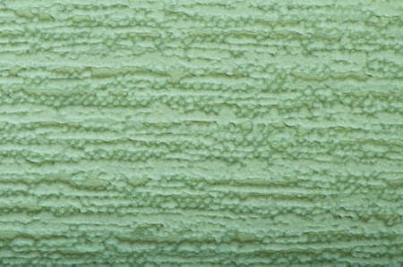 Green wallpaper texture. Close up part of wallpaperの写真素材