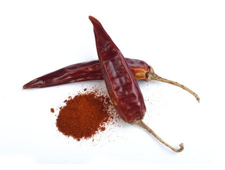 Dried chillies and chilli white isolated. Studio shot.