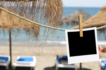 Pictures template hooked on a rope. Sky backgroundの写真素材