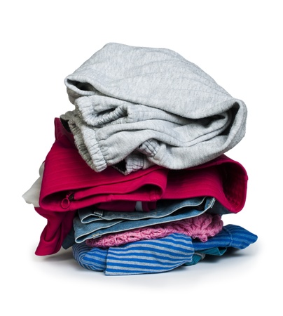Pile of clothes white isolated studio shotの写真素材