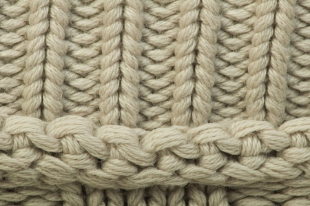 Old knit sweater background. Beige color. Studio shotの写真素材