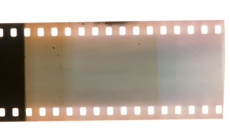 Old vintage film strip.Retro style. White isolatedの写真素材