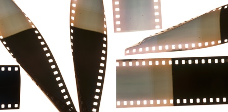Old vintage film strip.Retro style. White isolatedの写真素材