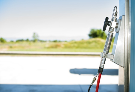 Device for charging gas car on gas station.の写真素材