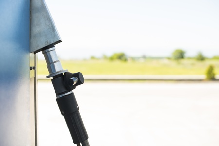 Device for charging gas car on gas station.