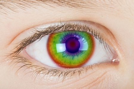 Human eye and light spectrum colors. Close up studio shotの写真素材