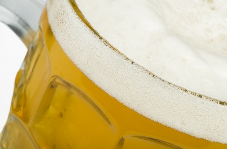 Mug filled with beer studio shotの写真素材