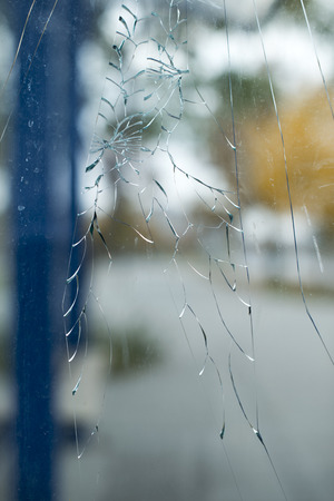 Cracked glass and city の写真素材