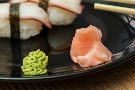 Sushi in sushi bar  Table and ration sushiの写真素材