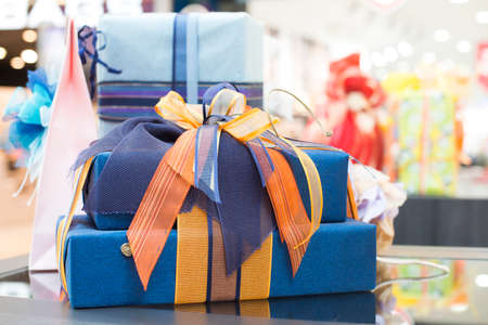Blue Gift boxes in shopping center. Authentic image