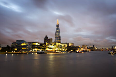 City of London on Thames. Sunset and city lightsの写真素材