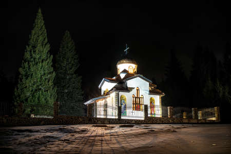 Ortodox church in mountain in the nightの写真素材