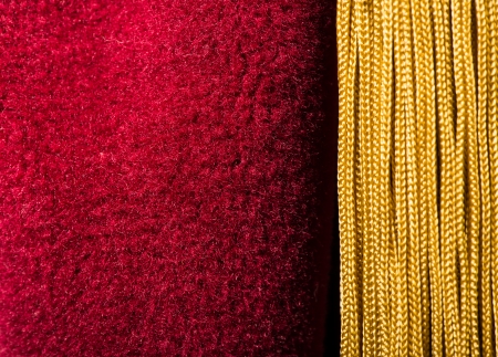 Red velvet curtain with tassel. Close upの写真素材
