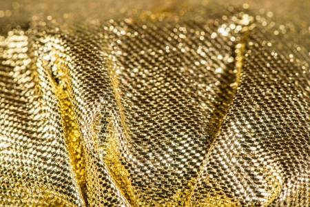 Shiny yellow textile background
