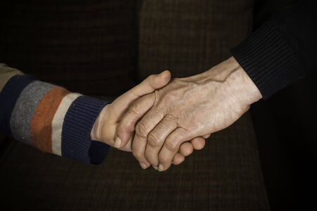 Two hands caught. Adult and child handの写真素材