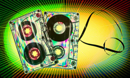 Vintage cassette tape on vintage rays background