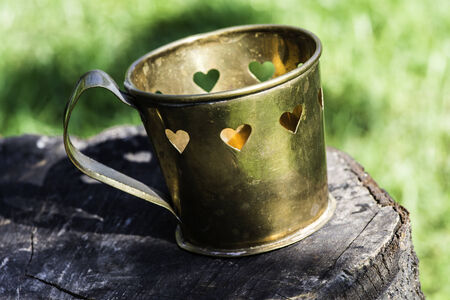 Metal cups with heart shapes.
