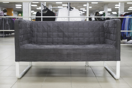 Small grey sofa in a shop