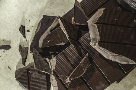 Chocolate bar crushed. Dark chocolateの写真素材