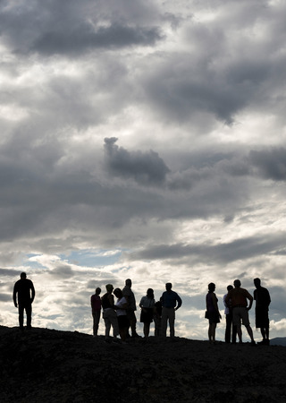People on the top of the rocks. Cloudy sky. Greece, Meteoraのeditorial素材