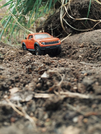 Toy adventure off road car. Travel in natureの素材