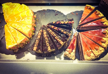 Cake in showcase at the shopの素材