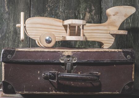 Children's toy wooden airplane. Vintage style.