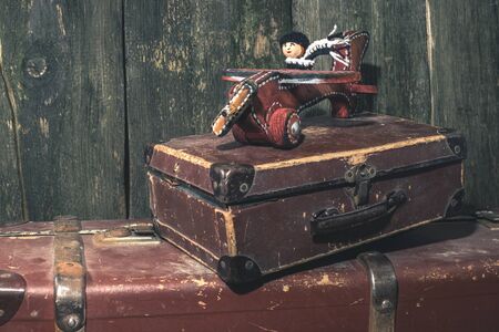 Vintage children's wooden toy airplane and manikin.の写真素材